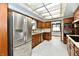 Spacious kitchen features stainless steel appliances and custom cabinets at 7912 E St Joseph St, Indianapolis, IN 46219