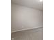 Unfurnished bedroom featuring neutral walls, carpet and a window at 12820 University Cres # 2D, Carmel, IN 46032