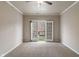 Bedroom with an open balcony with great neighborhood views at 12820 University Cres # 2D, Carmel, IN 46032