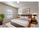 Bedroom featuring a large bed, carpet and a window with lots of light at 12820 University Cres # 2D, Carmel, IN 46032