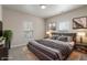Bedroom features a large bed, neutral walls and lots of light at 12820 University Cres # 2D, Carmel, IN 46032