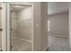Spacious walk-in closet with shelving perfect for organized storage at 12820 University Cres # 2D, Carmel, IN 46032