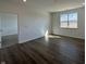 Inviting bedroom featuring wood-look flooring, recessed lighting, and a large window offering ample natural light at 273 Lar Lan Dr, Danville, IN 46122