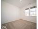 Bright and spacious bedroom with plush carpeting and a large window with natural light at 273 Lar Lan Dr, Danville, IN 46122