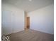 Comfortable bedroom features neutral carpeting and a closet perfect for storage at 273 Lar Lan Dr, Danville, IN 46122