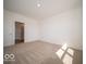 Spacious bedroom with walk-in closet and door to bathroom at 273 Lar Lan Dr, Danville, IN 46122