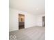 Neutral carpet bedroom, light walls, leading to bathroom and hall at 287 Lar Lan Dr, Danville, IN 46122