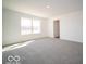 Spacious bedroom features neutral carpet, light walls, and a bright window at 287 Lar Lan Dr, Danville, IN 46122