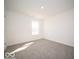 Bright bedroom with neutral carpet and natural light from the window at 287 Lar Lan Dr, Danville, IN 46122