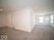 Bedroom with neutral carpet, bright windows, and light walls at 287 Lar Lan Dr, Danville, IN 46122