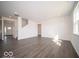 Bright living room with hardwood floors and recessed lighting, creating a modern and inviting space at 287 Lar Lan Dr, Danville, IN 46122