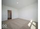 Spacious bedroom featuring neutral carpet and an ensuite bathroom at 301 Lar Lan Dr, Danville, IN 46122