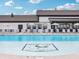 Stunning community pool with lounge chairs and umbrellas for relaxation at 301 Lar Lan Dr, Danville, IN 46122