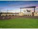Stone sign for Miles Farm with horse logo set in a landscaped area with a sunset at 301 Lar Lan Dr, Danville, IN 46122