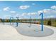 Community splash pad with various blue water features for to enjoy during the summer at 301 Lar Lan Dr, Danville, IN 46122