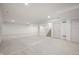 Unfinished basement space with carpet, recessed lighting, and access to upper levels via stairs at 798 Leila Mae Ln, Westfield, IN 46074
