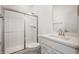Bathroom featuring a tiled shower with a sliding glass door and modern vanity at 798 Leila Mae Ln, Westfield, IN 46074
