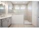 Modern bathroom features glass-enclosed shower, neutral tile, and ample lighting at 798 Leila Mae Ln, Westfield, IN 46074