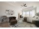 Bedroom features stylish decor, large windows, and comfortable seating area at 798 Leila Mae Ln, Westfield, IN 46074