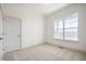 Bright bedroom with large windows, carpet, and ample natural light at 798 Leila Mae Ln, Westfield, IN 46074