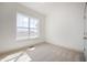 Bedroom featuring new carpet, fresh paint, and a large window overlooking the yard at 798 Leila Mae Ln, Westfield, IN 46074