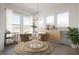 Bright dining room with modern decor, large windows, and stylish furnishings, perfect for entertaining at 798 Leila Mae Ln, Westfield, IN 46074