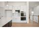 Well-equipped kitchen featuring double wall ovens, stainless steel appliances, and plenty of storage space at 798 Leila Mae Ln, Westfield, IN 46074