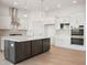 Stylish kitchen boasts a large island, stainless steel appliances, and plenty of cabinet space at 798 Leila Mae Ln, Westfield, IN 46074