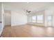 Bright living room with large windows, hardwood floors, and ample natural light at 798 Leila Mae Ln, Westfield, IN 46074