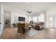 Bright living room features modern furnishings, large windows, and stylish decor at 798 Leila Mae Ln, Westfield, IN 46074