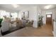 Bright home office features a modern desk, neutral decor, wood floors and plenty of natural light through large windows at 798 Leila Mae Ln, Westfield, IN 46074