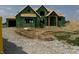 Under construction, the home's exterior is framed with green sheathing and features a covered porch entryway at 8030 Totton Ct, Zionsville, IN 46077