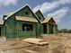 Under construction, the home's exterior is framed with green sheathing and features a covered porch entryway at 8030 Totton Ct, Zionsville, IN 46077