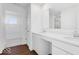 Bright bathroom featuring double sinks, white cabinets, and stylish finishes at 9344 Anthem Ave, Plainfield, IN 46168