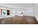 Open-concept kitchen with white cabinets, a center island, and stainless steel appliances at 9344 Anthem Ave, Plainfield, IN 46168