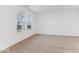 Spacious bedroom with neutral carpet, bright natural light, and backyard view at 235 Hunters Ridge Dr, Danville, IN 46122