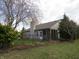 Home featuring a fenced yard, screened porch, and well-maintained landscaping providing a private outdoor retreat at 744 Helm Dr, Avon, IN 46123