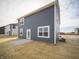 New construction home with backyard patio and installed air conditioner at 7904 Magnolia St, New Palestine, IN 46163