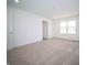Bedroom featuring carpet floors, neutral walls, and ample natural light at 7904 Magnolia St, New Palestine, IN 46163