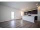 Modern kitchen with stainless steel appliances, center island and dark cabinets at 7904 Magnolia St, New Palestine, IN 46163