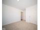 Bright bedroom featuring plush carpeting and double door closet at 1426 Bluebonnet Pl, Shelbyville, IN 46176