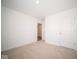 Spacious bedroom with neutral decor, carpet flooring, and a large window at 1426 Bluebonnet Pl, Shelbyville, IN 46176