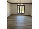 Dining room features hardwood floors, neutral walls, and a chandelier at 4256 Bending Ln, Greenwood, IN 46143