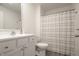 Clean bathroom with white vanity and shower at 1501 Coen Ct, Columbus, IN 47201