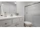 Updated bathroom with a shower/tub combo and white vanity at 1501 Coen Ct, Columbus, IN 47201