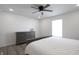Bright bedroom featuring a dresser and a comfortable bed at 1501 Coen Ct, Columbus, IN 47201