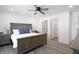 Spacious bedroom with large bed and en-suite bathroom at 1501 Coen Ct, Columbus, IN 47201