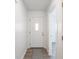 Bright entryway with white door and wood-look floors at 1501 Coen Ct, Columbus, IN 47201