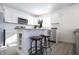 Open concept kitchen with island and stainless steel appliances at 1501 Coen Ct, Columbus, IN 47201