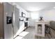 Modern kitchen with stainless steel appliances and white cabinets at 1501 Coen Ct, Columbus, IN 47201